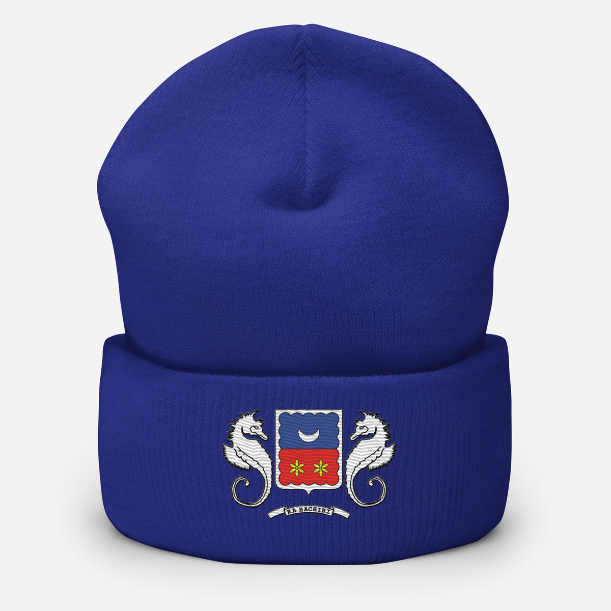 Bonnet bleu roi à revers vu de face, orné du blason de Mayotte avec deux hippocampes blancs et l’inscription « Ra Hachiri ».
